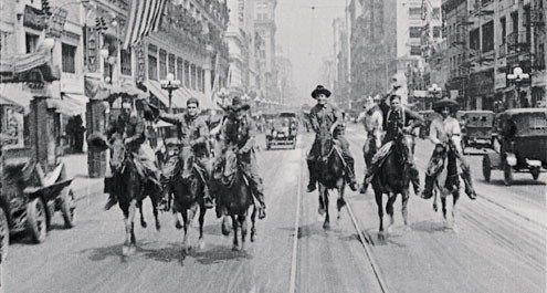 Cowboys riding through New York (actually downtown Los Angeles) in Bucking Broadway (1917)